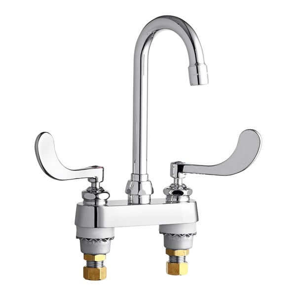 A chrome Chicago Faucets deck-mounted faucet with two handles.