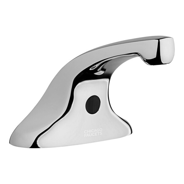 A chrome Chicago Faucets touchless faucet with a black circle around the button.