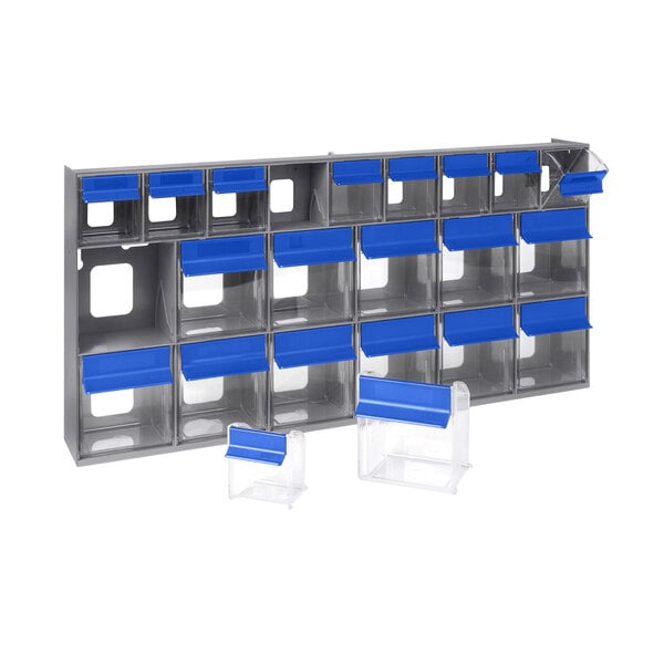 A silver metal storage unit with blue plastic bins.