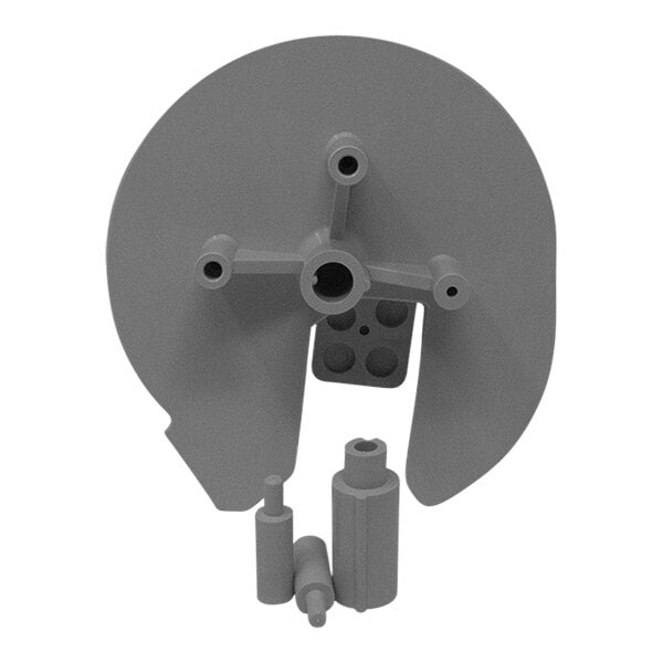A grey plastic Tach-It 3" core adapter with holes and a round base.