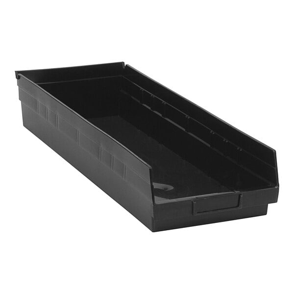 A black plastic Quantum conductive shelf bin.