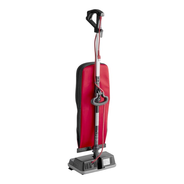 A red and black Hoover Superior Lite upright vacuum cleaner.