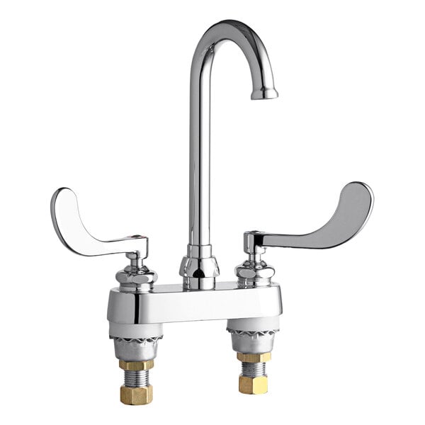 A chrome Chicago Faucets deck-mounted faucet with two handles.