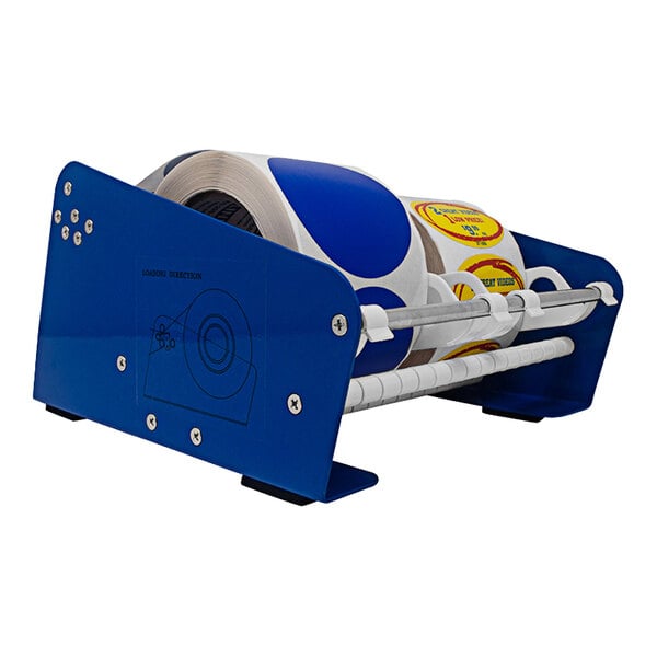 A Tach-It PDL8 tabletop label dispenser with a roll of labels in it.