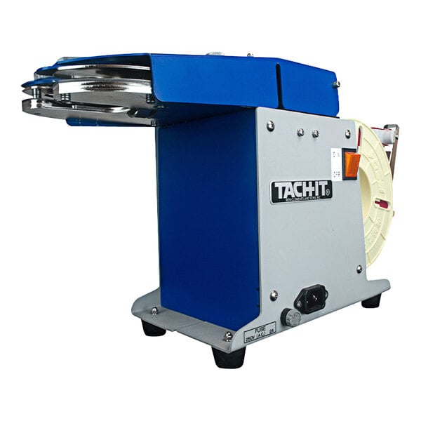 A blue and white Tach-It 3570 Semi-Automatic Twist Tie Machine.