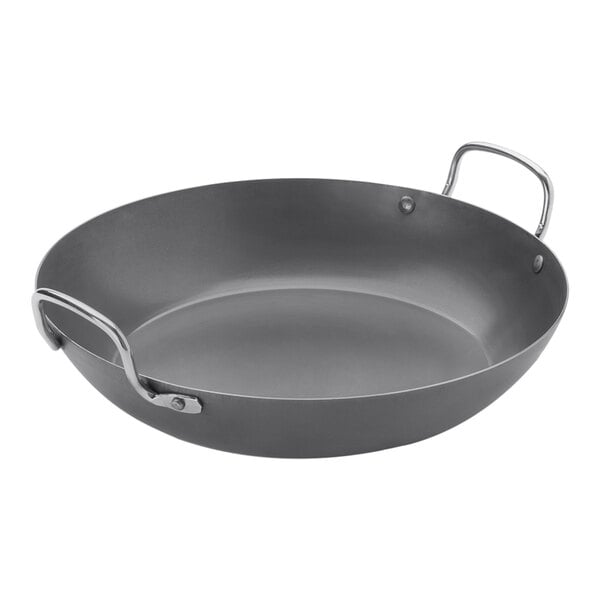 An American Metalcraft black carbon steel paella pan with handles.