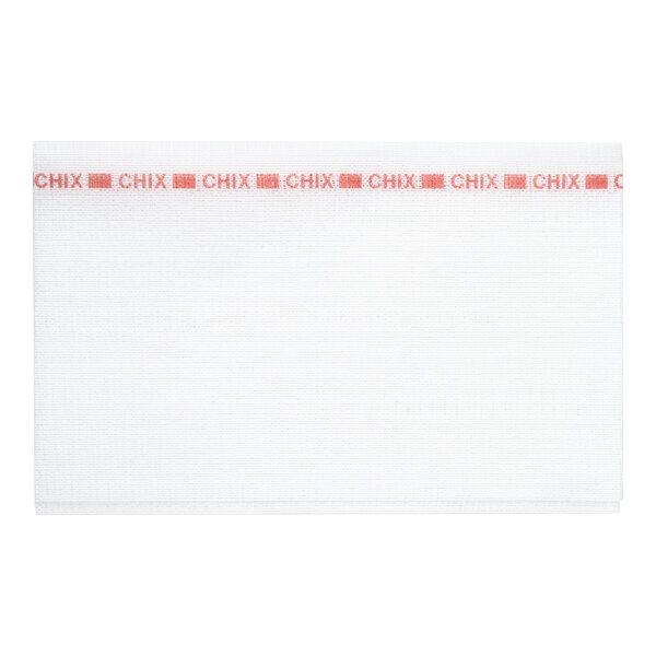 A white rectangular towel with a red border along the top edge featuring repeating text and block patterns.