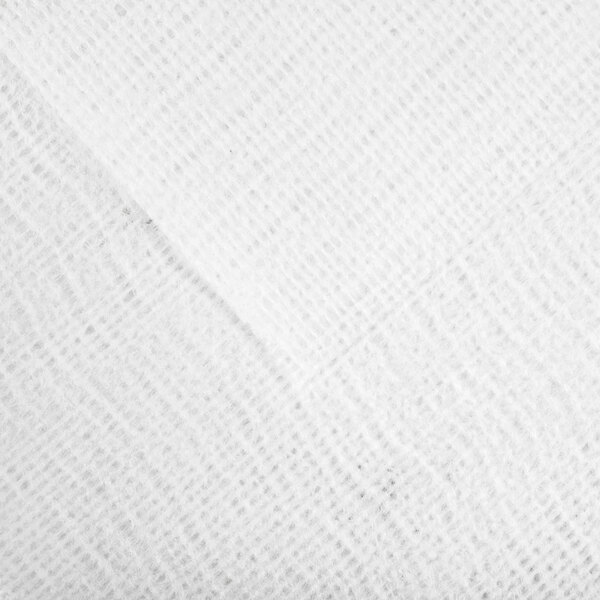 A close-up view of a white, textured, woven fabric with a subtle grid pattern.