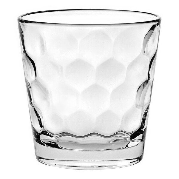A clear Vidivi by BauscherHepp Rocks glass with a hexagon pattern.