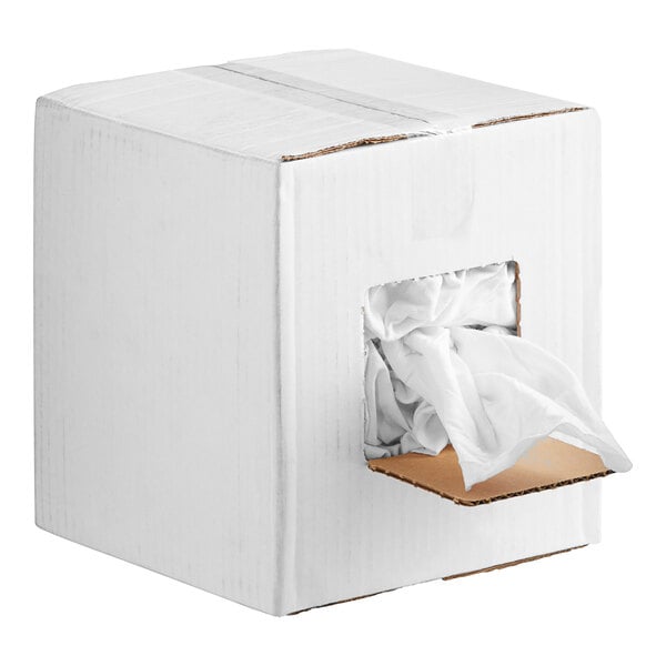 A white box with a hole in it containing a white bag of Monarch Brands White T-Shirt Rags.