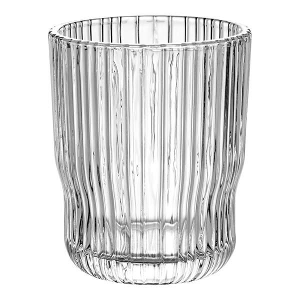 A clear glass cup with a striped pattern.