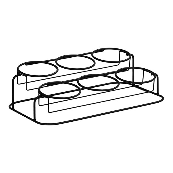 A black wire Cal-Mil Madison 2-tier rack with round black jars on a counter.