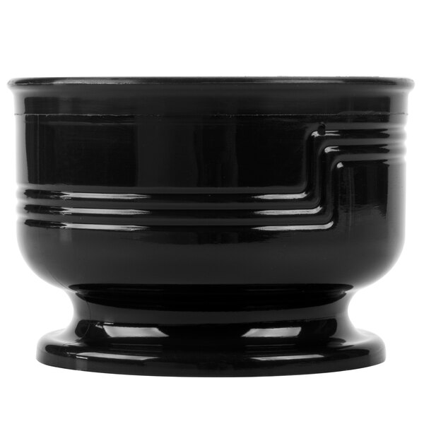 A black Cambro Shoreline bowl with a curved edge.