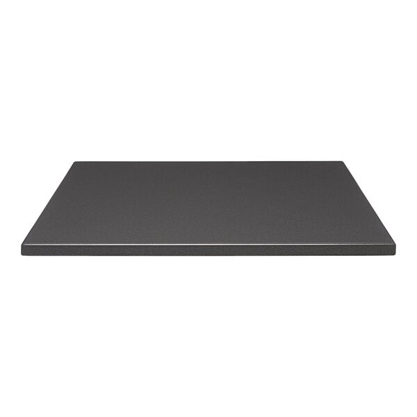 A close-up of a Perfect Tables graphite table top.