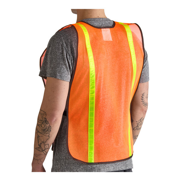 A person wearing an orange high visibility mesh safety vest with 1-inch reflective tape.