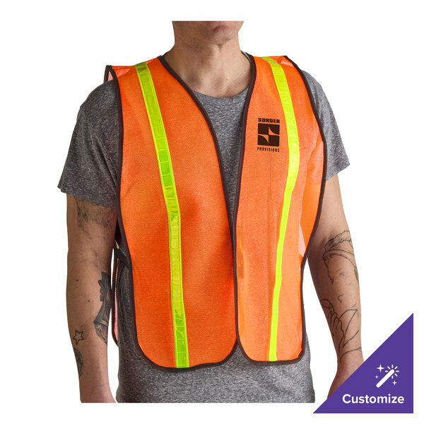 An orange high visibility mesh safety vest with 1-inch reflective tape, worn over a gray shirt.