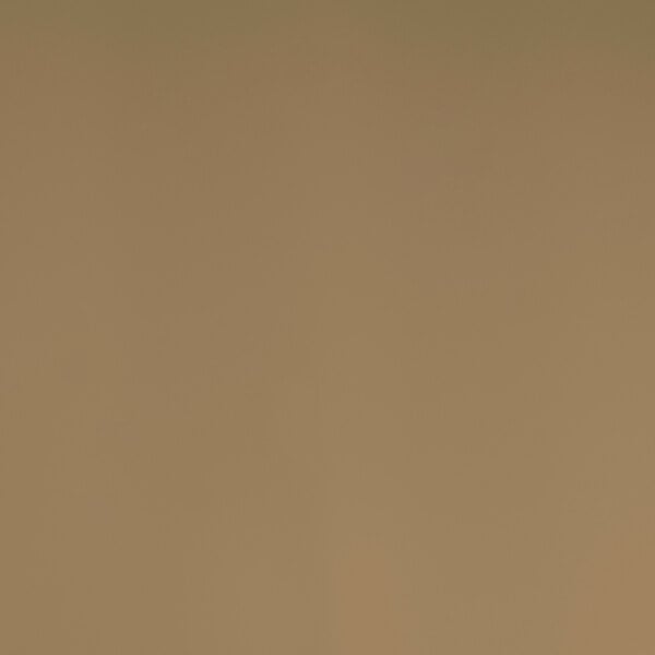 A Perfect Tables round smokey taupe table top with a smooth finish.