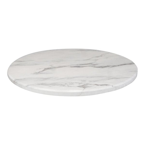 A white marble table top with grey veining.