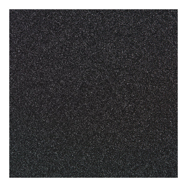 A Perfect Tables round graphite table top with a black and white speckled surface.