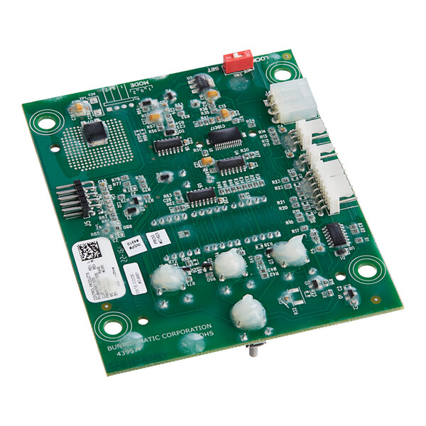 The green Bunn Main Control Board Assembly Kit with white and black components on a green circuit board.