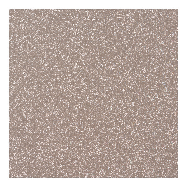 A close-up of a beige and brown speckled concrete table top.