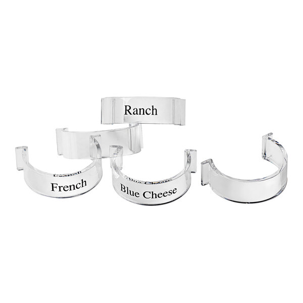 A group of clear plastic Cal-Mil juice and salad dressing bottle clips with black text.