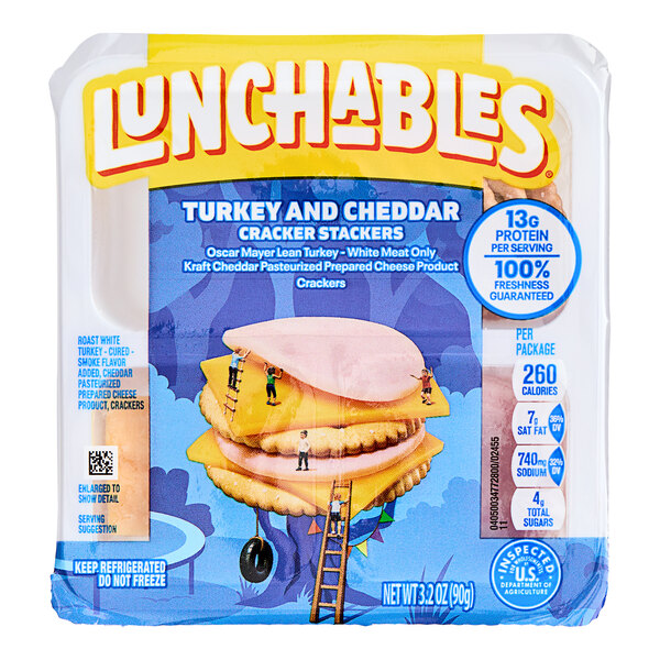 A package of Lunchables Turkey and Cheddar Cracker Stackers on a white background.
