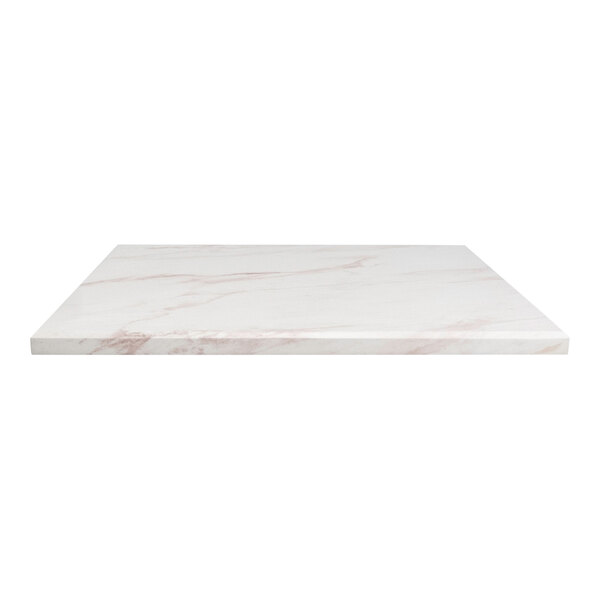 A white marble table top with copper accents.