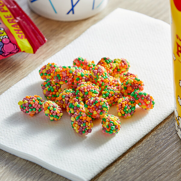 A pile of Nerds Gummy Clusters on a napkin.