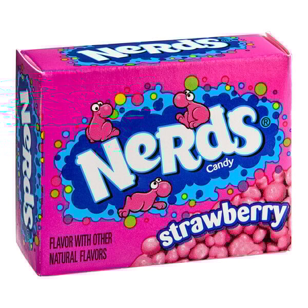 A pink box of Nerds candy with a cartoon dinosaur on it.
