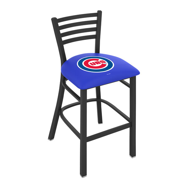 A Holland Bar Stool Chicago Cubs bar stool with a blue padded seat and logo.