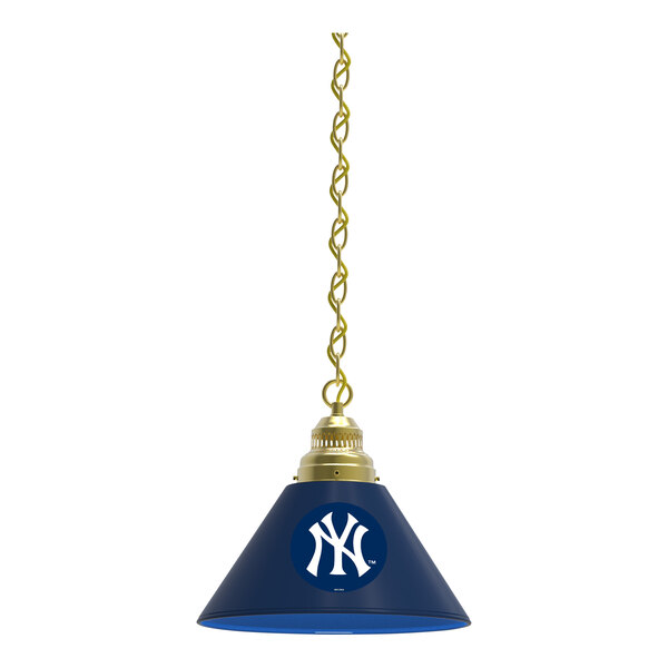 A blue lamp shade with a white New York Yankees logo and brass accents.