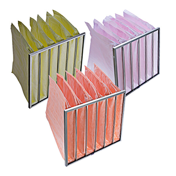 Three Koch Filter Multi-Sak air filters in different colored plastic bags on a metal rack.