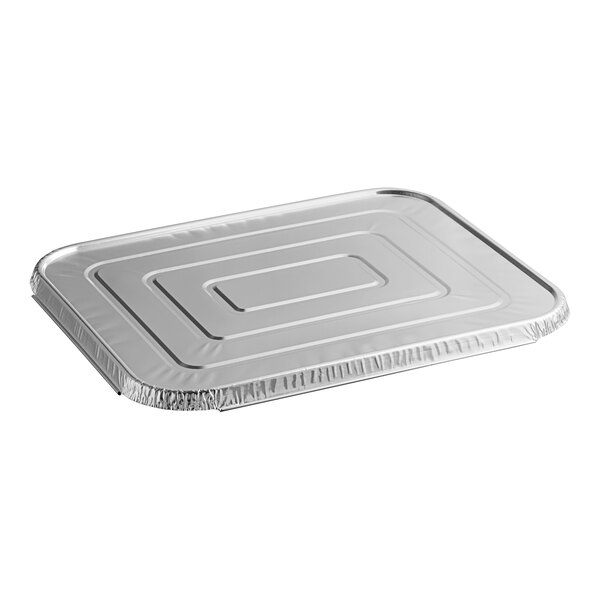 A Western Plastics silver aluminum foil lid on a tray.