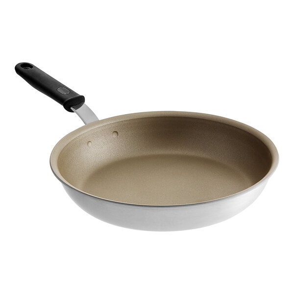 A Vollrath Wear-Ever aluminum non-stick frying pan with a black silicone handle.
