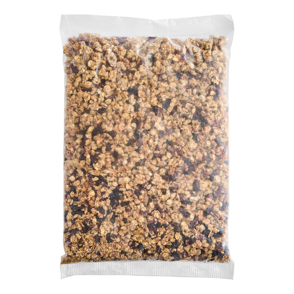 A bag of Nature Valley Oats and Fruit Granola on a white background.