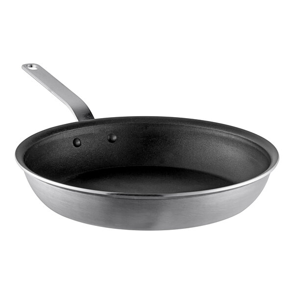 A close-up of a Vollrath Wear-Ever aluminum non-stick fry pan with a black handle.