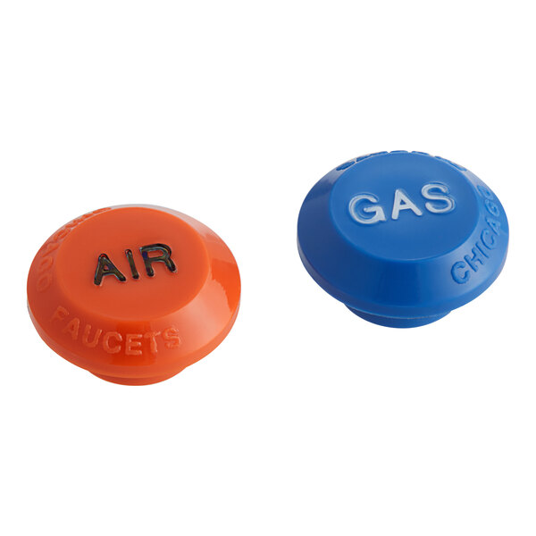 A Chicago Faucets deck-mounted laboratory turret with a blue and orange gas valve and yellow index button.