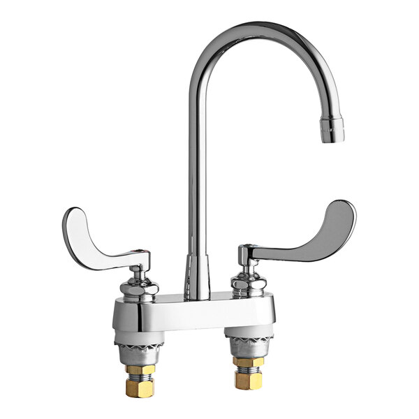 A chrome Chicago Faucets deck-mounted faucet with two handles.