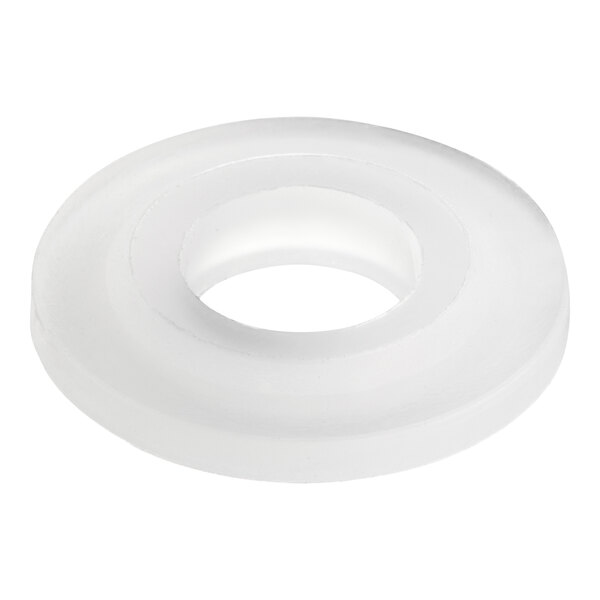 A white plastic circular slinger with a hole in the center.