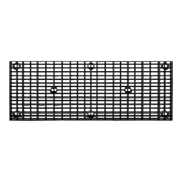 A close-up of a black plastic grid with holes.