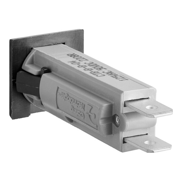 A close-up of a Bunn circuit breaker, a grey electrical device with black text, and two wires attached.