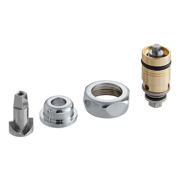 A group of Chicago Faucets brass and chrome self-closing cartridge parts.