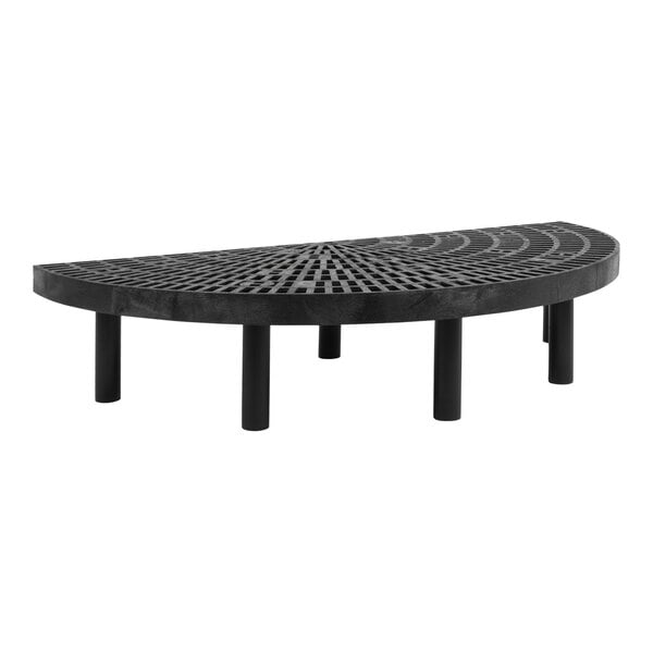 A black plastic half round grid display platform with black legs.