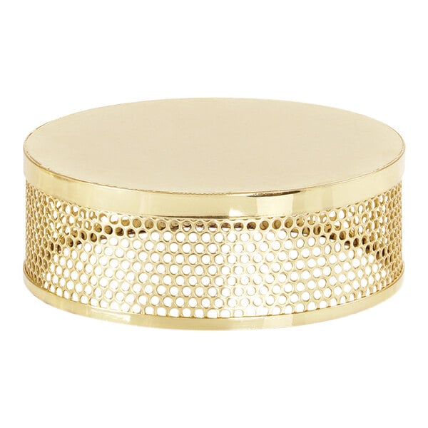 A gold metal Cal-Mil display riser with a circular mesh design.