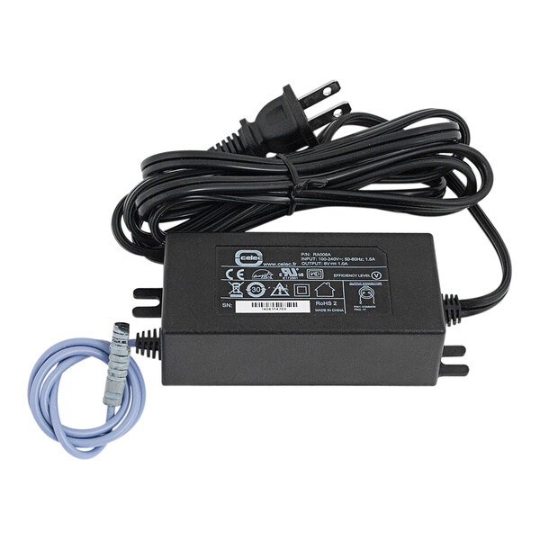 A black Chicago Faucets wall-mounted transformer with wires.