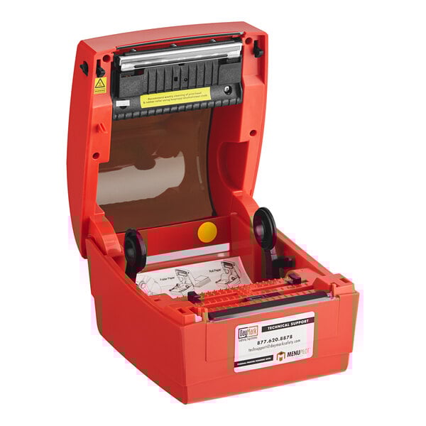 A red DayMark Matt85 label printer printing black and red labels.