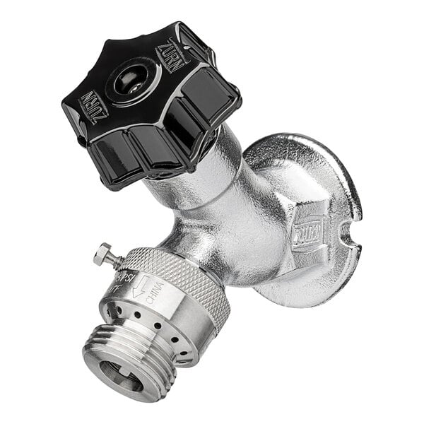 A silver Zurn exposed wall faucet with a black knob.