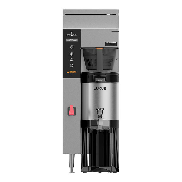 A Fetco CBS-1241 Plus automatic coffee brewer with a silver finish and black trim.