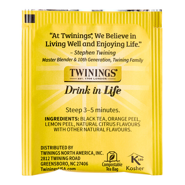 A yellow box of Twinings Lady Grey Tea Bags on a store shelf.